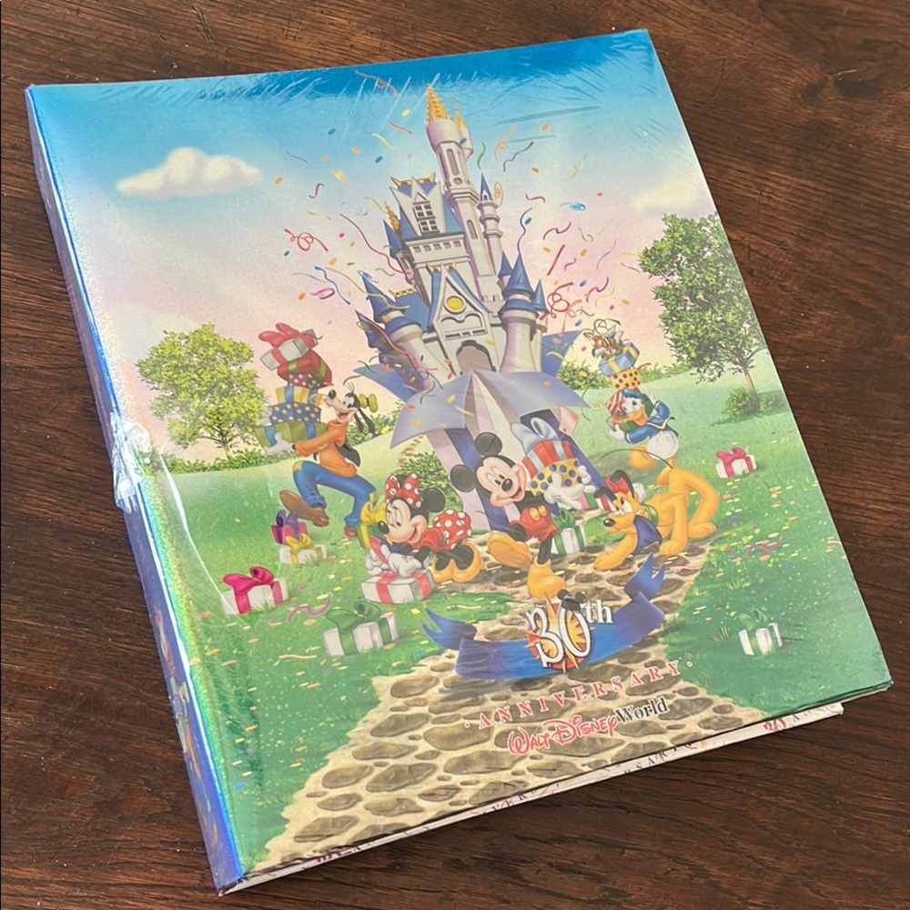 WaltDisneyWorld 30th Anniversary photo album. 40 pages.